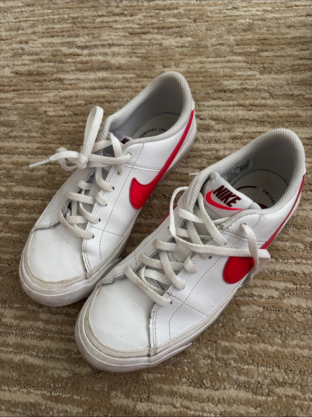 Nike White Low-Top Sneakers with Red Swoosh